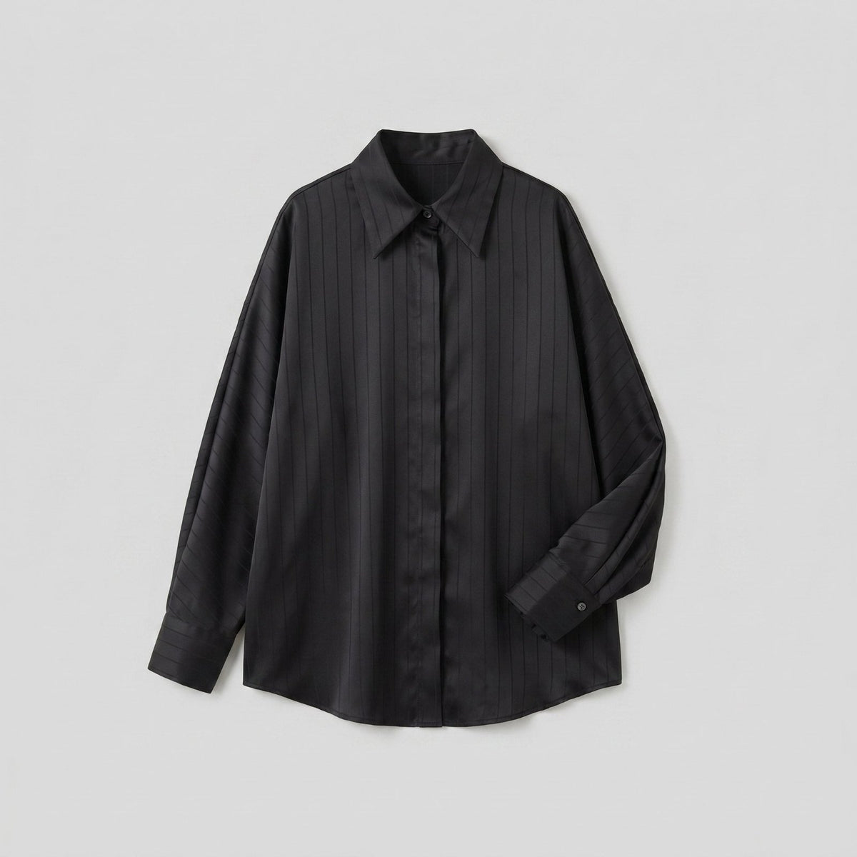 Celia Oversized Shirt in black - flat product shot