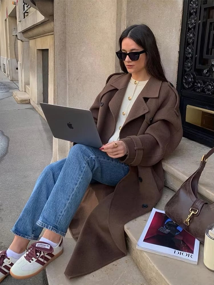Wool Longline Trench Coat in brown - worn by a model outdoors