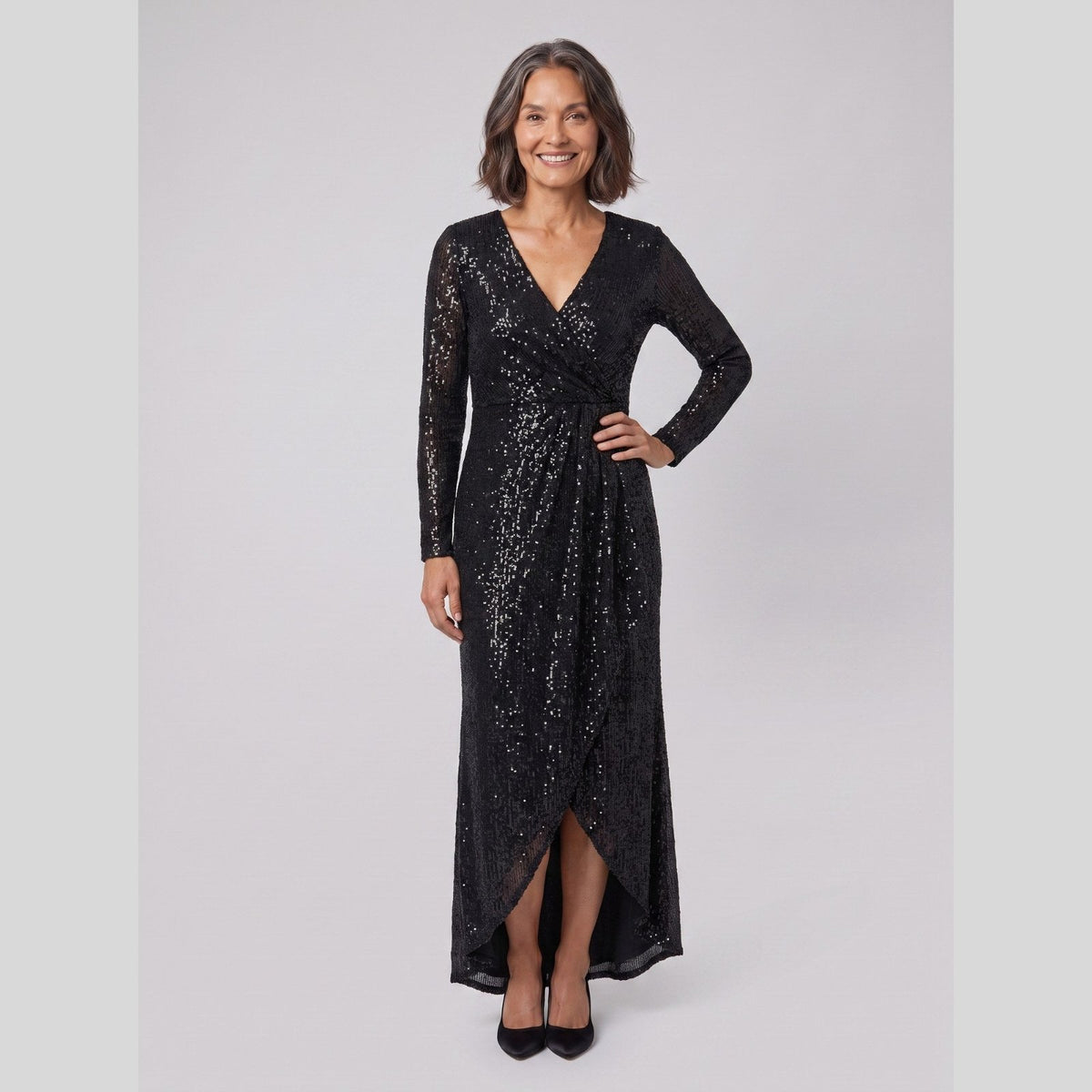 Astra Sequin Gown with Asymmetric Hem in black - worn by a model, front view