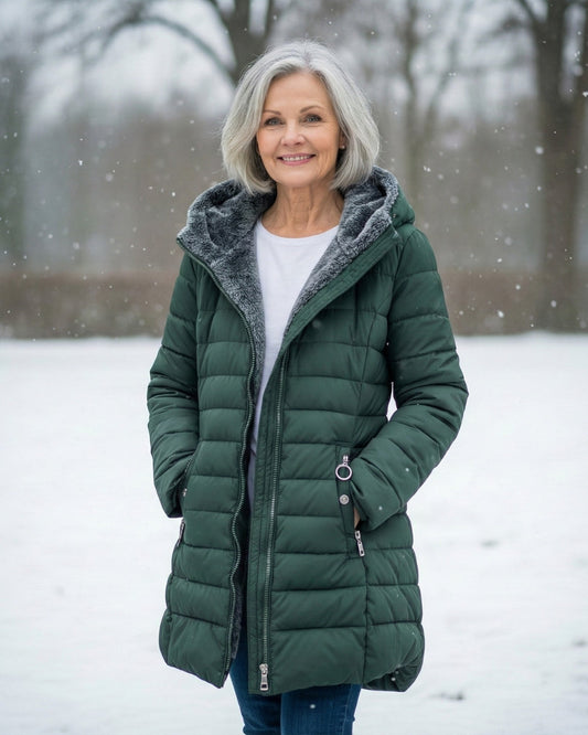 Ava Insulated A-Line Puffer Coat in Dark Green - worn by a model outdoors