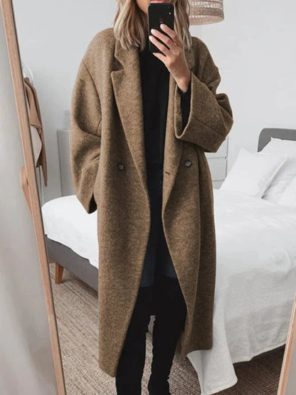 Celeste Oversized Long Coat in Brown - worn by a model, front view