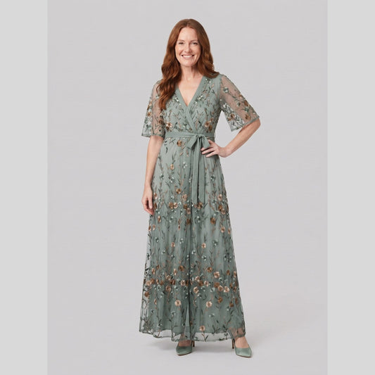 Dalia Embroidered Sheer Evening Gown in Green - worn by a model, front view