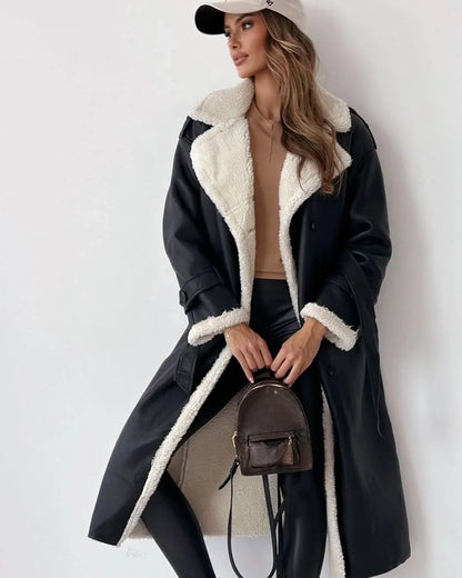 Double Breasted Trench Coat in Black - worn by a model, front view
