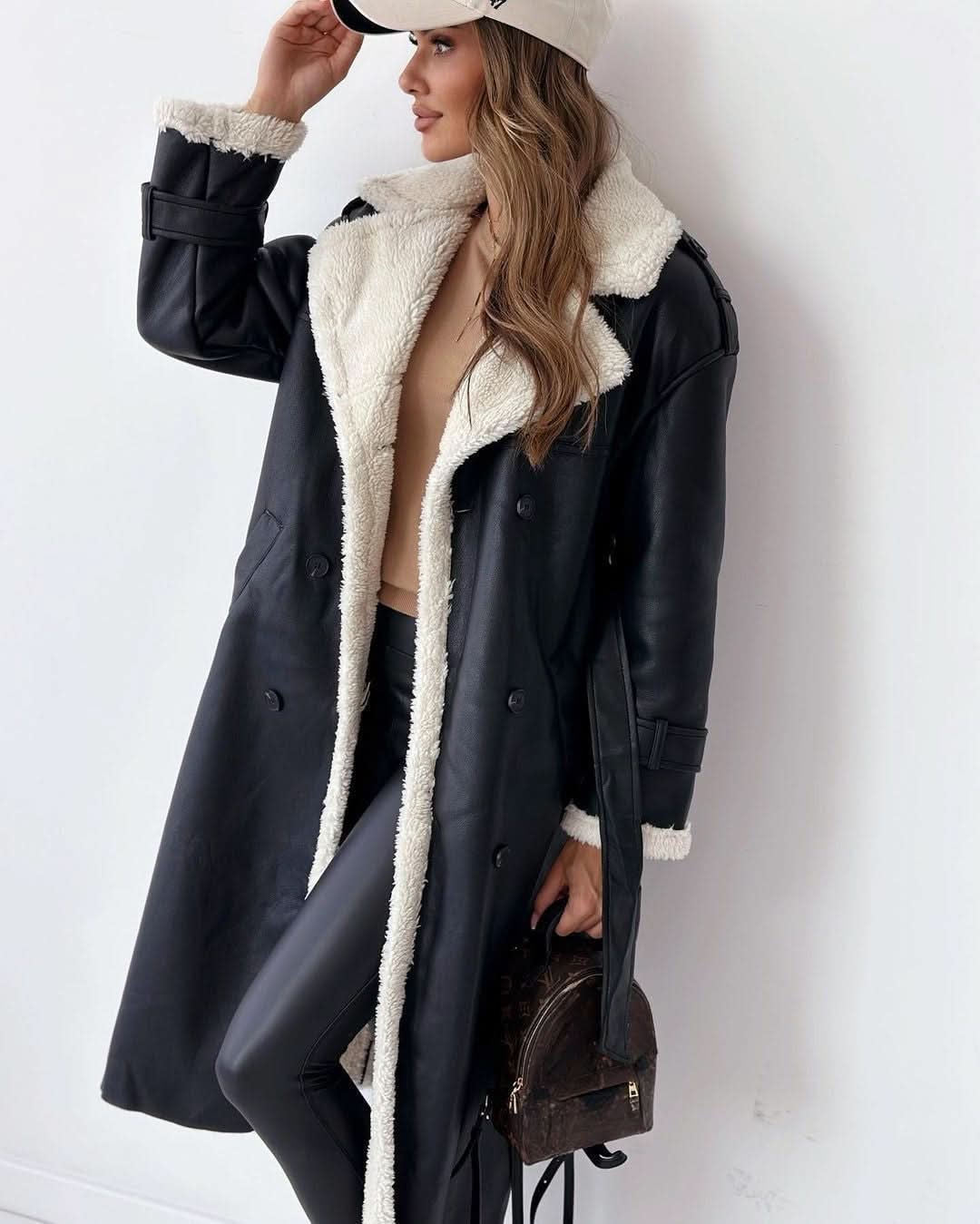 Double Breasted Trench Coat in Black - worn by a model, front view