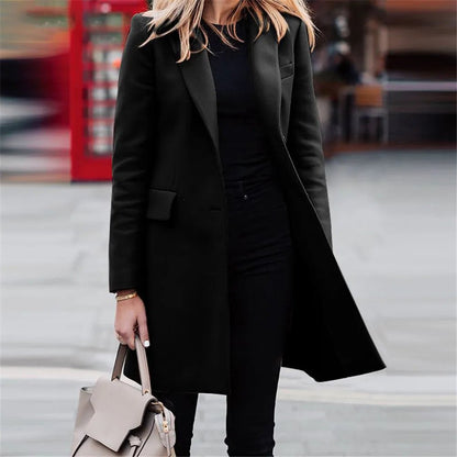 Eleri Notch Lapel Coat in Black - worn by a model outdoors