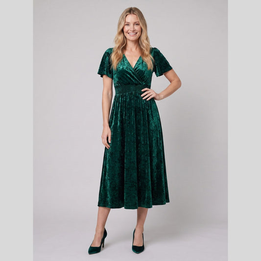 Emeraude Ribbed Velvet Midi Dress in Dark Green - worn by a model, front view