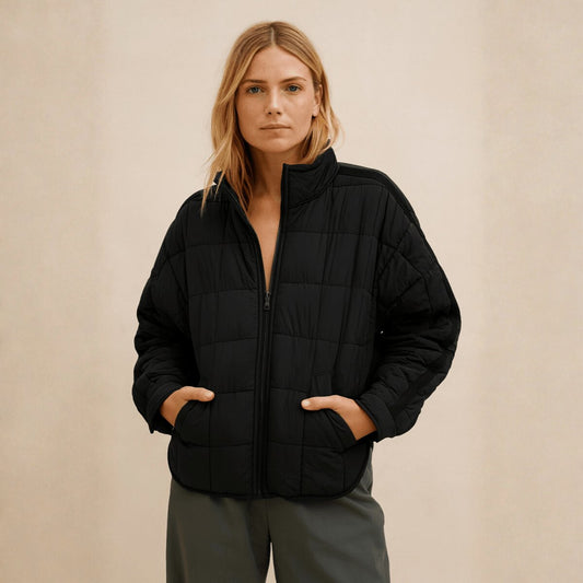 Hannah Lightweight Packable Puffer Jacket in Black - worn by a model, front view