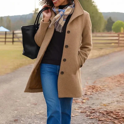 Heledd Longline Coat in Brown - worn by a model outdoors