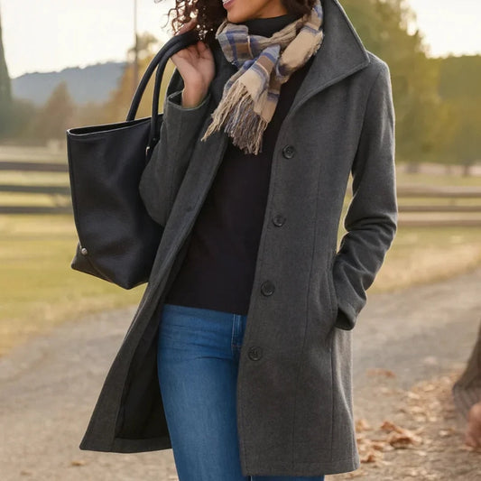Heledd Longline Coat in Gray - worn by a model outdoors