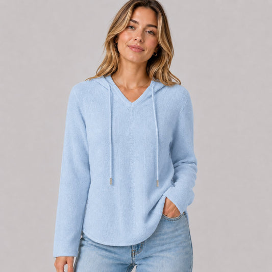 Hooded Knit Sweater in Light Tones in Light Blue - worn by a model, front view