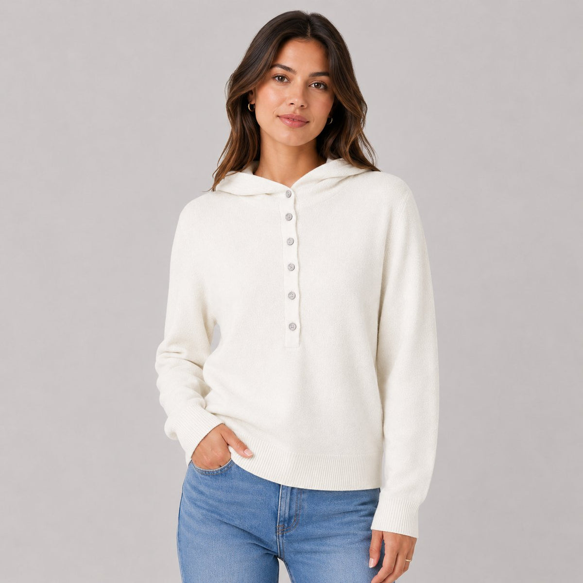 Hooded Knit Sweater in White - worn by a model, front view