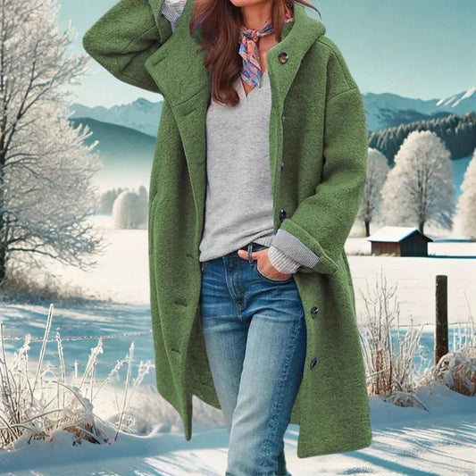 Hooded Longline Teddy Coat in Green - worn by a model outdoors