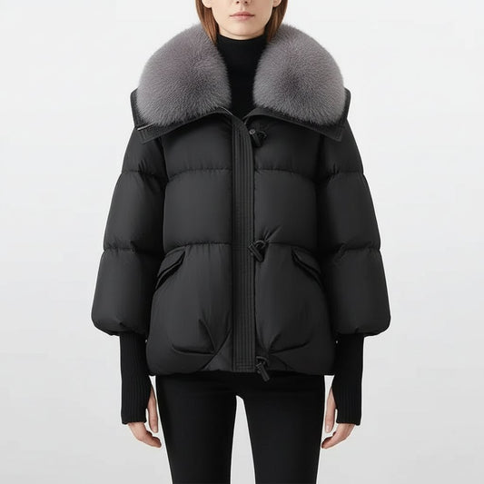 Isla Long Puffer Coat with Faux Fur Hood in Black - close-up of the faux fur collar