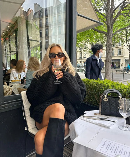 Knit Hooded Sweater in black - worn by a model outdoors