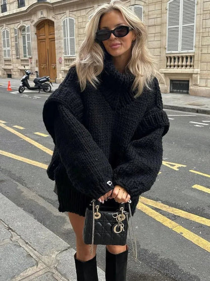 Knit Hooded Sweater in black - worn by a model outdoors