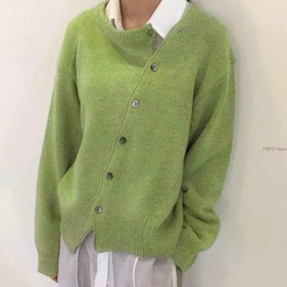Lucille Soft Knit Sweater in Green - worn by a model, front view