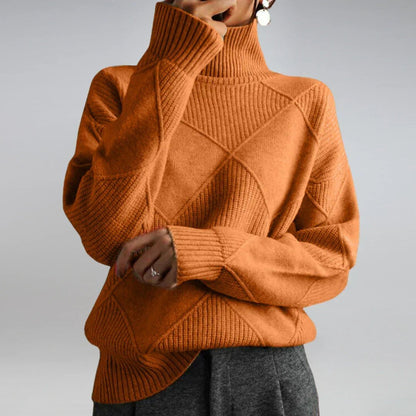 Lydia Luxury Cashmere Blend Turtleneck in orange - worn by a model, front view