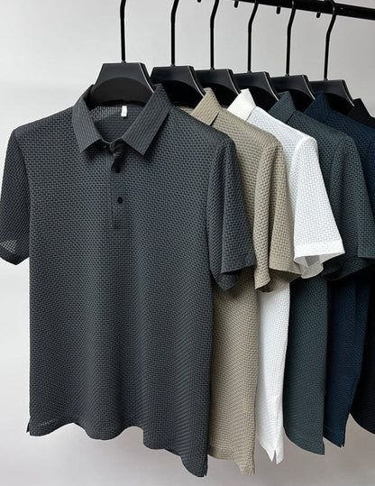Men polo shirts in several colours on hangers 10