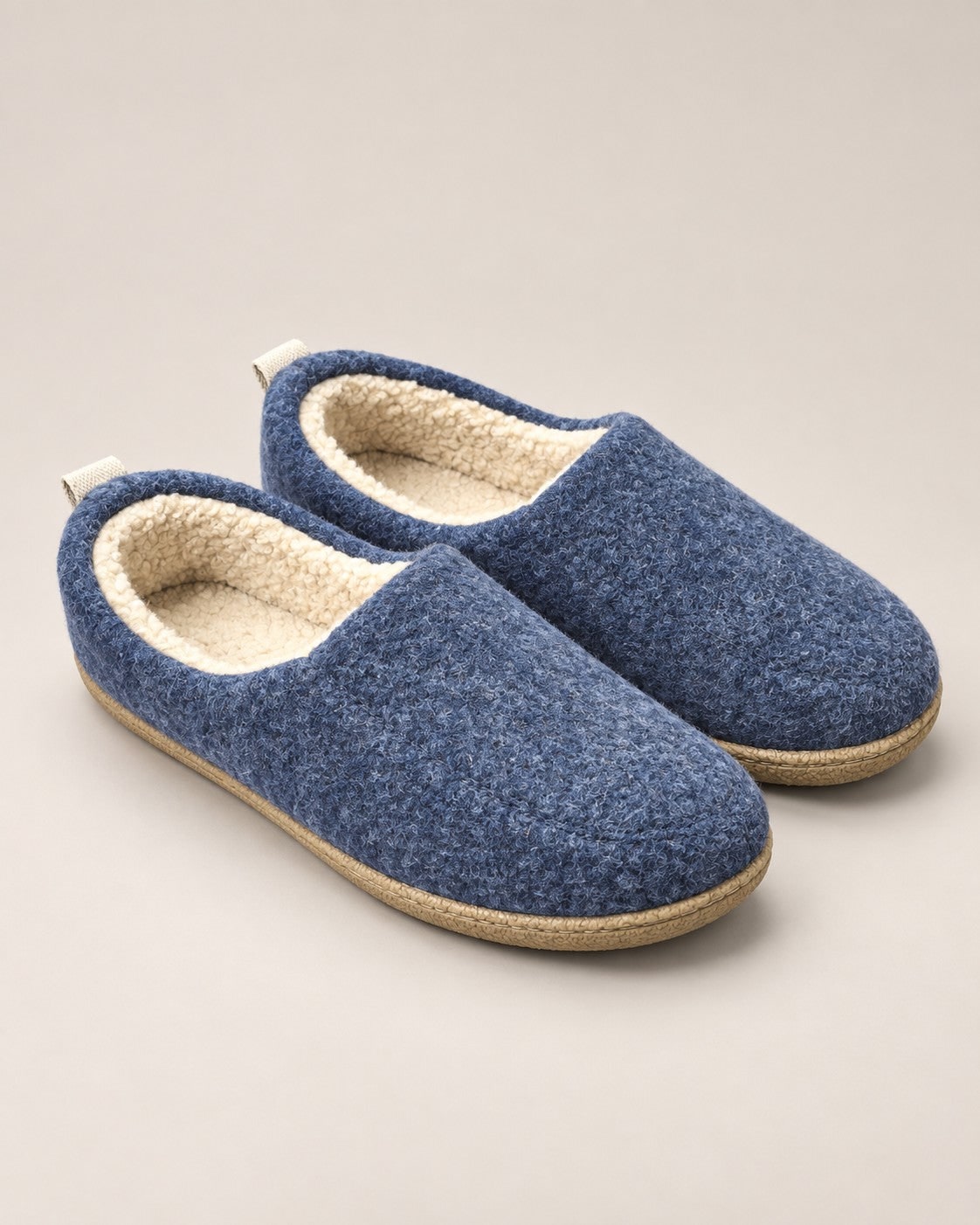 Navy blue fleece lined orthopedic slippers, pair seen from the side 1