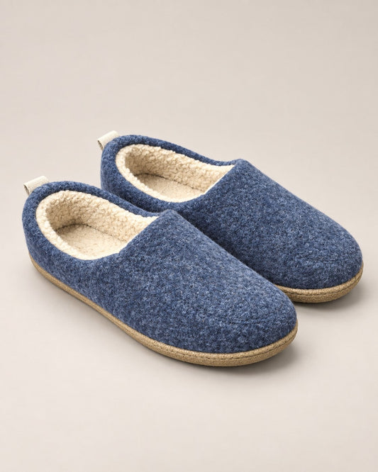 Navy blue fleece lined orthopedic slippers, pair seen from the side 1