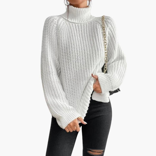 Oversized Turtleneck Jumper in White - worn by a model, front view