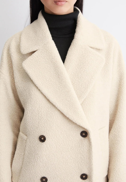 Petronille Double Breasted Pea Coat in Ivory Cream - close-up of the lapel