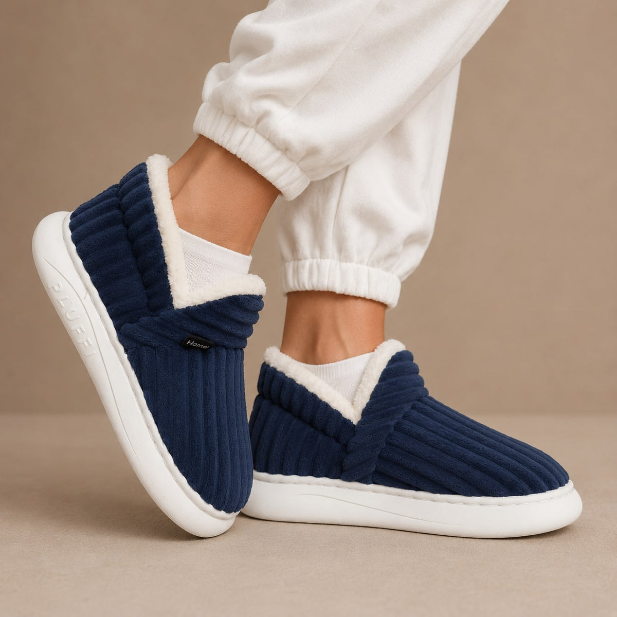 Navy ribbed fleece lined slippers worn at home 1