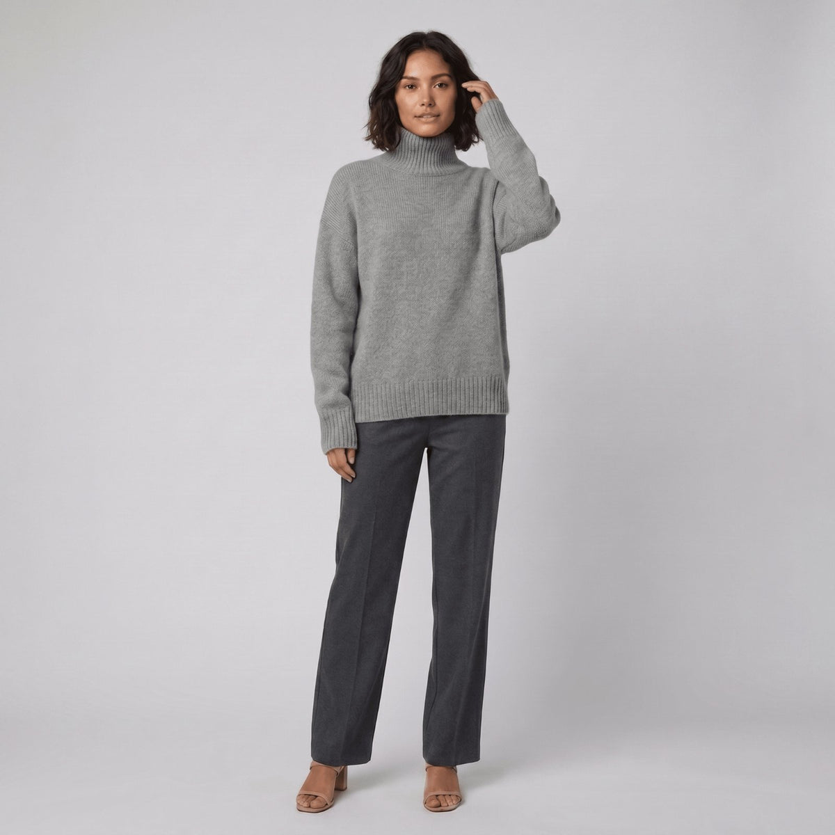 Soft Knit Turtleneck in Grey - worn by a model, front view