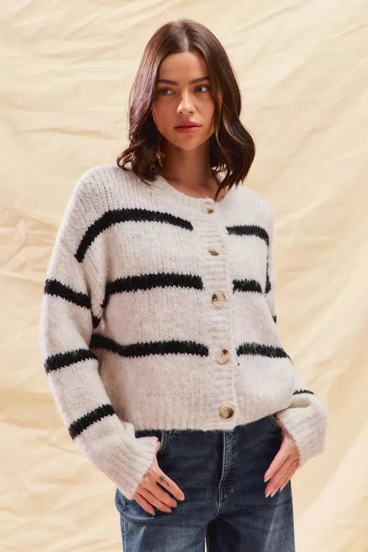 Striped Button Front Cardigan in White - worn by a model, front view