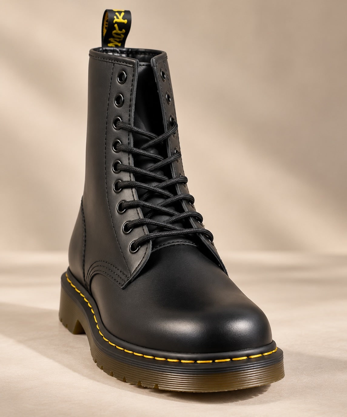 Black leather lace-up boot, front view with 8 eyelets 4