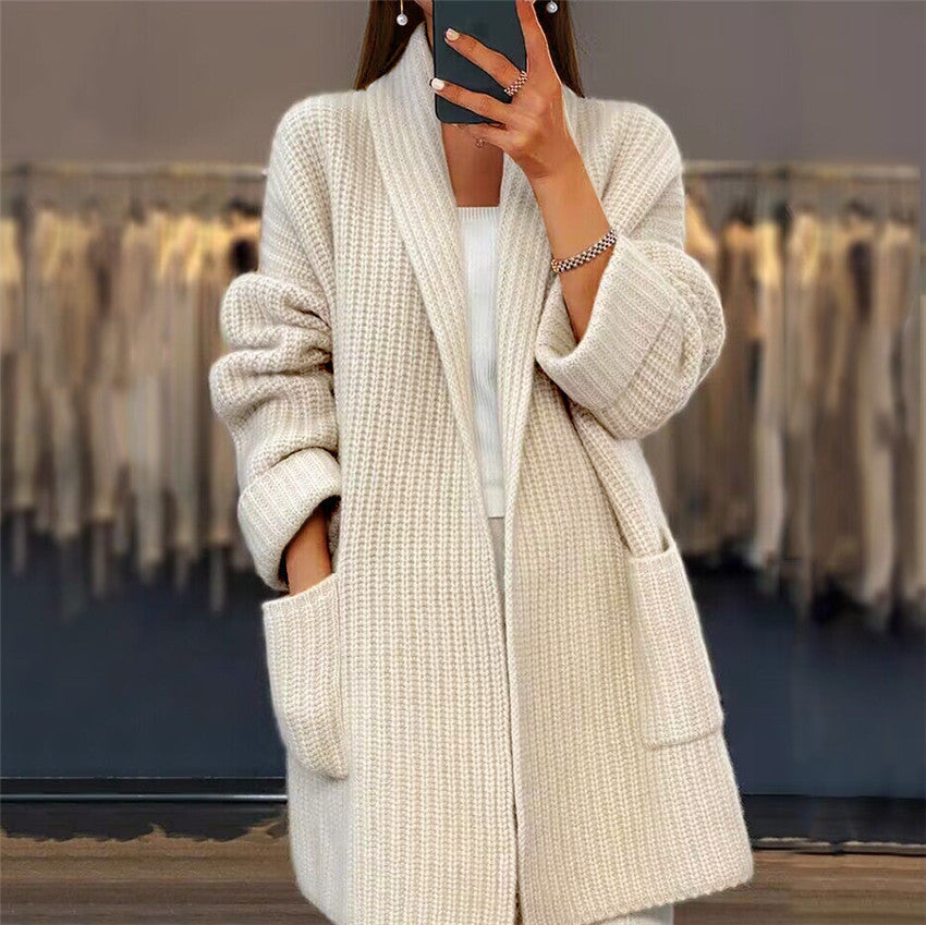 Winnie Longline Knit Cardigan with Pockets in beige - worn by a model, front view