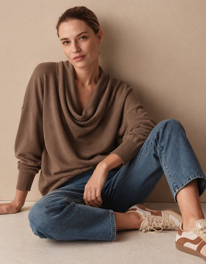 Brown cowl neck sweater worn with jeans and sneakers 3