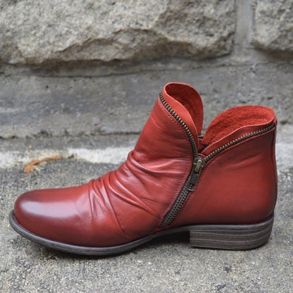 Red ankle boot with side zip, side view 9