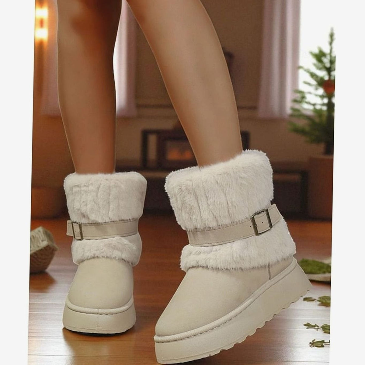 Beige fur-trimmed snow boots worn indoors with bare legs 7