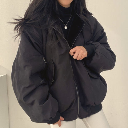Black reversible jacket worn open 6