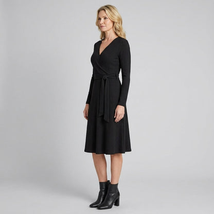 Wynne Ribbed Knit Belted Midi Dress in black - worn by a model, front view